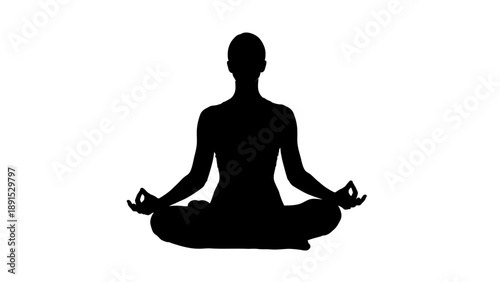 Silhouette of a person meditating in a lotus position.