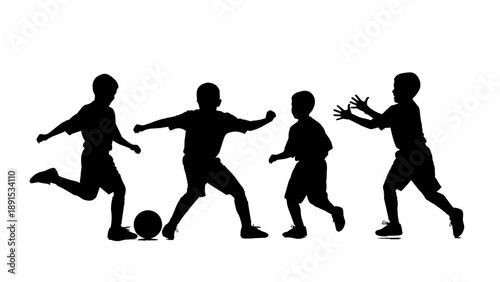 Silhouette of children playing soccer and having fun.