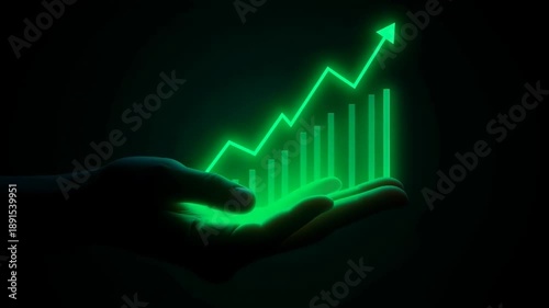 Digital Data: Green luminous chart floating above a hand in dark background