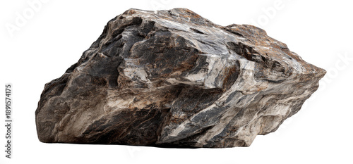 A large, irregular, dark-gray and light-gray stone, exhibiting a complex, uneven texture.  The rock shows a variety of patterns and striations, giving it a natural, rough appearance