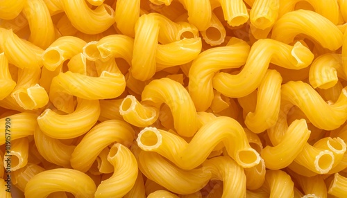 Close-up shot of uncooked cavatappi pasta spirals, a popular Italian food ingredient.