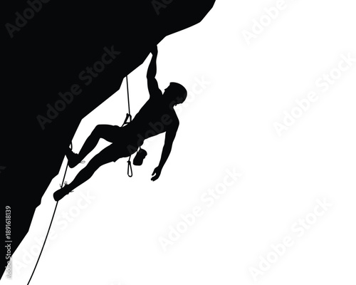 A silhouette of a man rock climbing on a steep cliff face with a rope