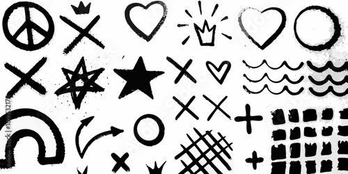 Collection of hand drawn doodles and whimsical symbols in black and white