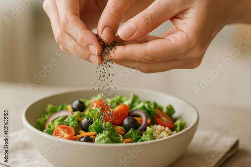 Healthy daily rituals include adding chia seeds to fresh salad bowls for nutritious blue zones inspired meals full of vibrant vegetables and fruits