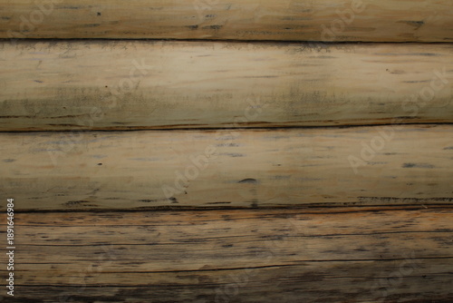 beautiful natural wooden logs stacked in a row	
