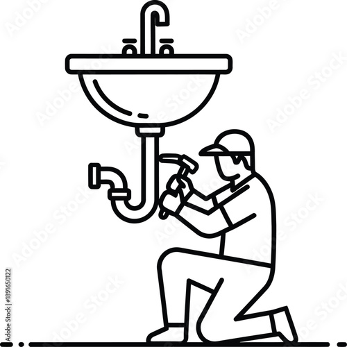 A professional plumber performing repair work on a bathroom or kitchen sink