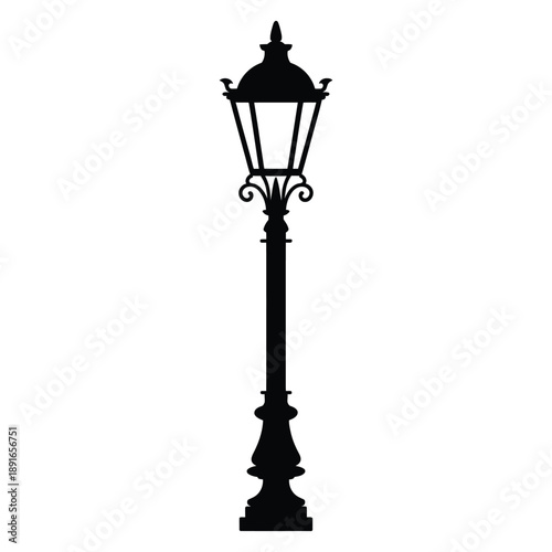 A detailed silhouette of an ornate vintage street lamp post