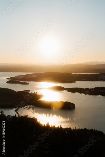 Wide panoramic view of Storøya island in Tyrifjorden lake during sunset, Kongens Utsikt, Norway