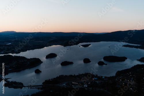Woman Watching Sunset Over Tyrifjorden from Kongens Utsikt, Norway
