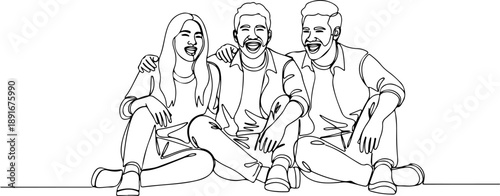 Three friends sitting together and laughing