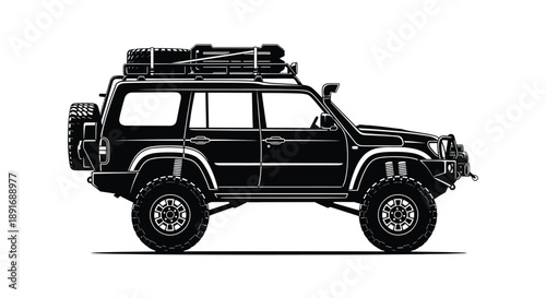 A rugged, off-road vehicle is equipped for adventure with a rooftop cargo carrier and spare tire.