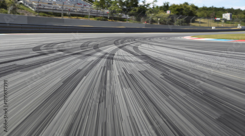 Racing track dynamic asphalt surface motion blur with tire marks