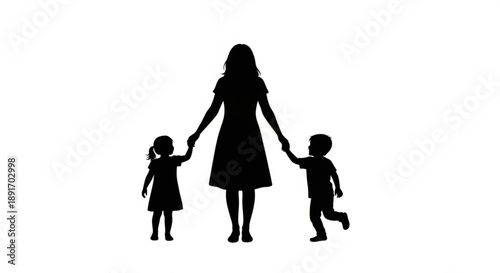 Mother and children walking hand in hand in silhouette