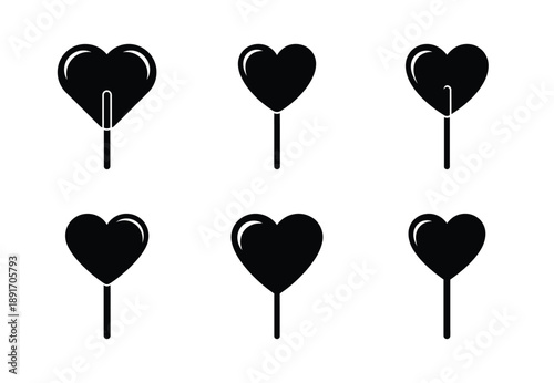 Collection of a black heart lollipop vector icon set. valentines day silhouette icons.