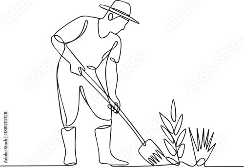 Man cultivating plants in garden with a shovel from a side view