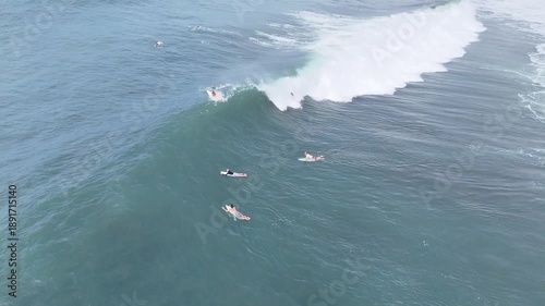 Aerial Drone Shot Tracking Surfer on Powerful Open Ocean Wave