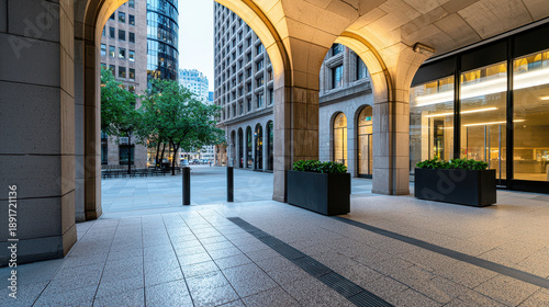 Wallpaper Mural Modern urban architecture with arches and lighting, showcasing city plaza at dusk, creating serene atmosphere Torontodigital.ca