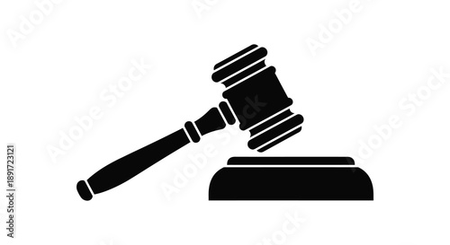 A stark black silhouette of a gavel resting on a sound block represents legal proceedings and justice silhouette