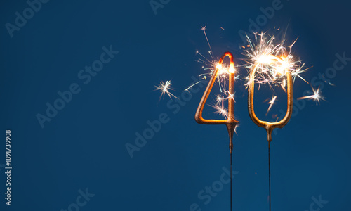 Wallpaper Mural 40 years anniversary celebration festive background with copy space made with Bengal fire in the form of number Forty. Torontodigital.ca