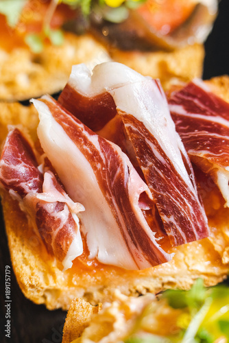 Spanish Toast with Iberian Ham, Traditional Tapas Close Up