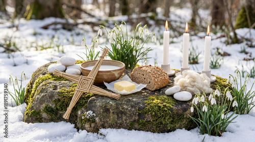 Outdoor Imbolc Altar with Brigid's Cross, Milk, Candles, and Snowdrops on Mossy Stone for Pagan Winter Rituals, Celtic Fire Festival, and Early Spring Spirituality Blogs