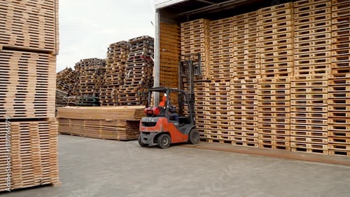 Production of pallets. Warehouse of pallets at the factory. Professional industrial drying of finished pallets for preparation for sale