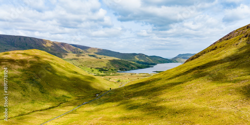 Beautiful aerial view of Connemara region in Ireland. Scenic Irish countryside landscape with mountains on the horizon, County Galway, Ireland.