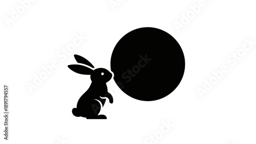 Silhouette of a rabbit looking at a large black circle.