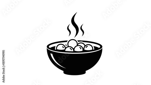 Steaming Hot Soup in a Bowl with Round Ingredients.