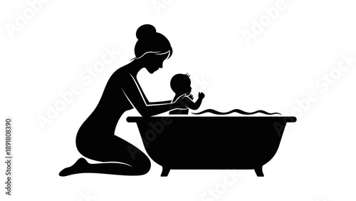 Mother bathing her baby in a bathtub kneeling beside it.