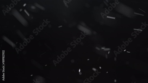 Powerful winter blizzard with snow rushing fast in one direction under strong wind. Dense snow particles move past the camera, creating an intense storm atmosphere for cinematic backgrounds.