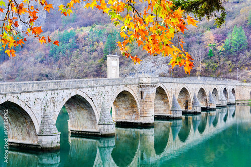 Mehmed Pasha Sokolovic Bridge over the Drina River in Visegrad, Bosnia and Herzegovina, historic travel destination and cultural landmark.