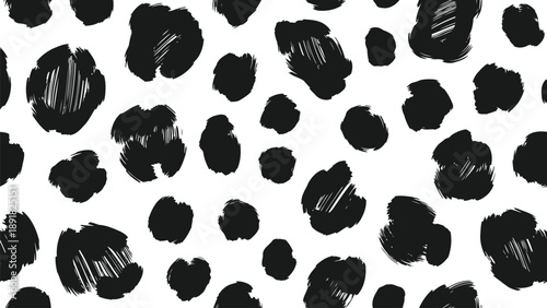 Seamless hand-drawn black and white leopard print pattern with textured brushstroke spots on a clean background.