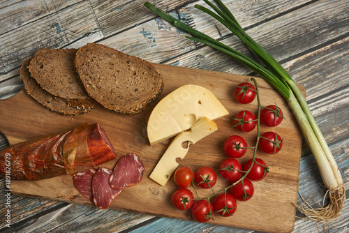 Wallpaper Mural Sliced food on a wooden board Torontodigital.ca