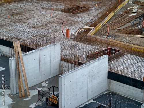 Cuadro en lienzo site view of slab and wall construction, initial stage of foundation with framin