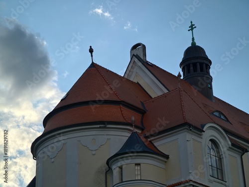 Fotografie classic church with terracotta domes and intricate details illuminated by late a