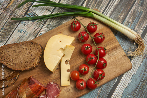 Wallpaper Mural Sliced food on a wooden board Torontodigital.ca