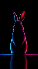 Neon rabbit silhouette lit with vibrant blue pink red glow on dark backdrop