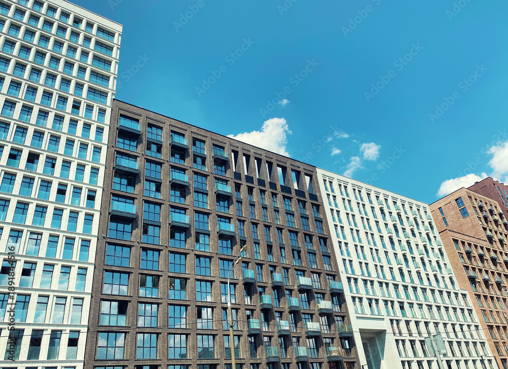 Fototapeta premium Architecture and real estate, modern residential apartment building with large panoramic windows