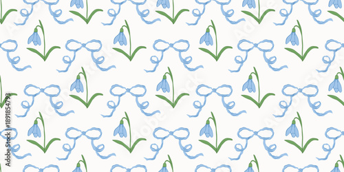 Seamless pattern with hand drawn snowdrop flowers and blue bows. Delicate botanical floral wallpaper in a romantic coquette spring for fabric, wallpaper or wrapping paper. trendy elegant style