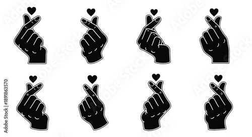 Multiple hands making a heart shape with fingers a black silhouette