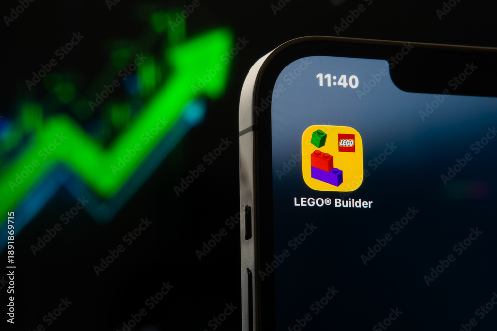 Fototapeta premium LEGO Builder icon on screen with growth chart representing brand value and toy market concept. Sonora, Mexico - January 27, 2026