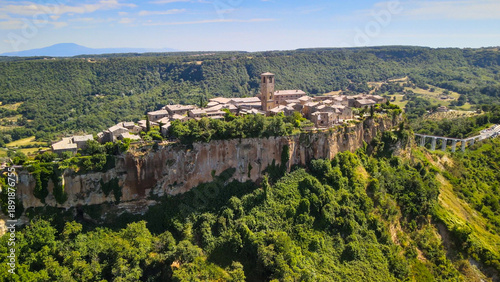 Tableau sur toile Panoramic aerial view of Civita di Bagnoregio from a flying drone around the medieval city, Italy