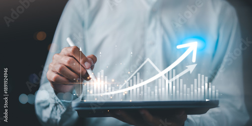 Foto Digital growth analytics concept with hands using tablet, data visualization, bar charts, upward arrow