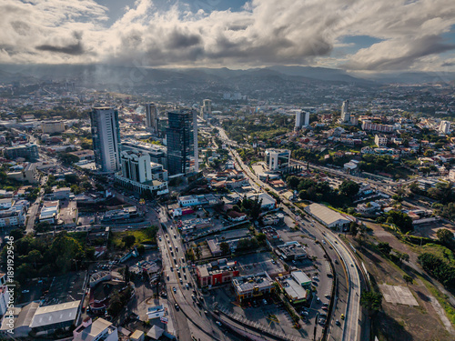 Beautiful aerial view of Tegucigalpa, capital of Honduras, surrounded by mountains and the city glowing across the urban valley