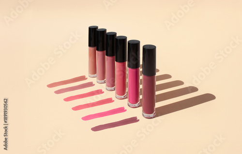 Φωτογραφία Lipstick set, collection, palette, color set, assortment isolated on beige background