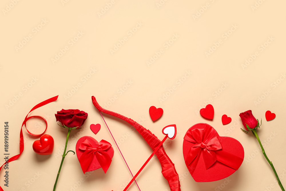 Fototapeta premium Composition cupid's bow, gift boxes and rose flowers on color background. Valentine's Day celebration