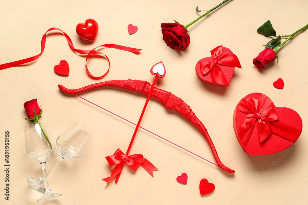 Fototapeta premium Composition with cupid's bow, gift boxes, rose flowers and glasses on color background. Valentine's Day celebration
