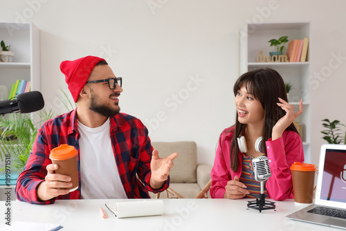 Couple of podcasters with c...