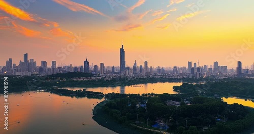 Aerial shot of the Nanjing city skyline and Xuanwu Lake during a beautiful sunset in China.